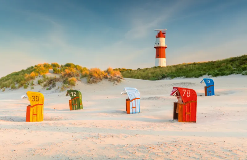 Lighthouse Behind The Dune On Borkum