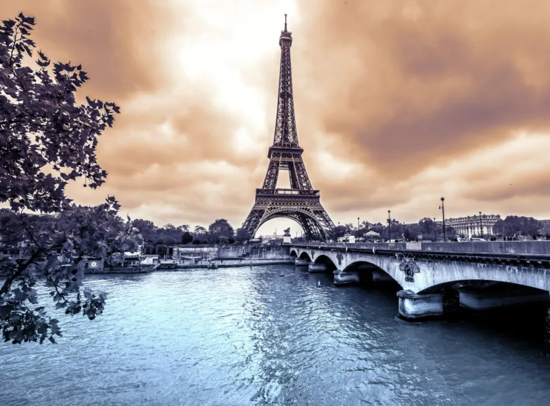 Eiffel Tower from Seine. Winter rainy day in Paris