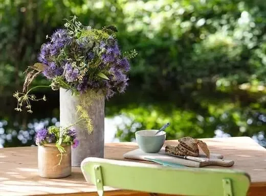Floral Greeting At The Garden Table